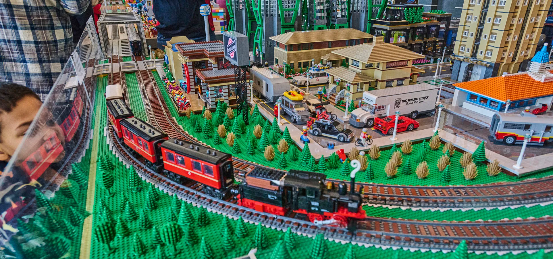 Lego train in a forest city